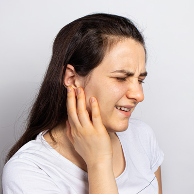 what are the symptoms of tmj
